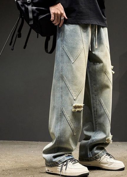 Чоловічі широкі джинси baggy світло-блакитні з потертостями та поясом на резинці M 100157 фото